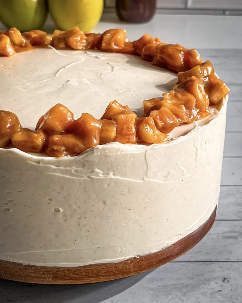 Apple pie cake decorated with apple filling and crumble