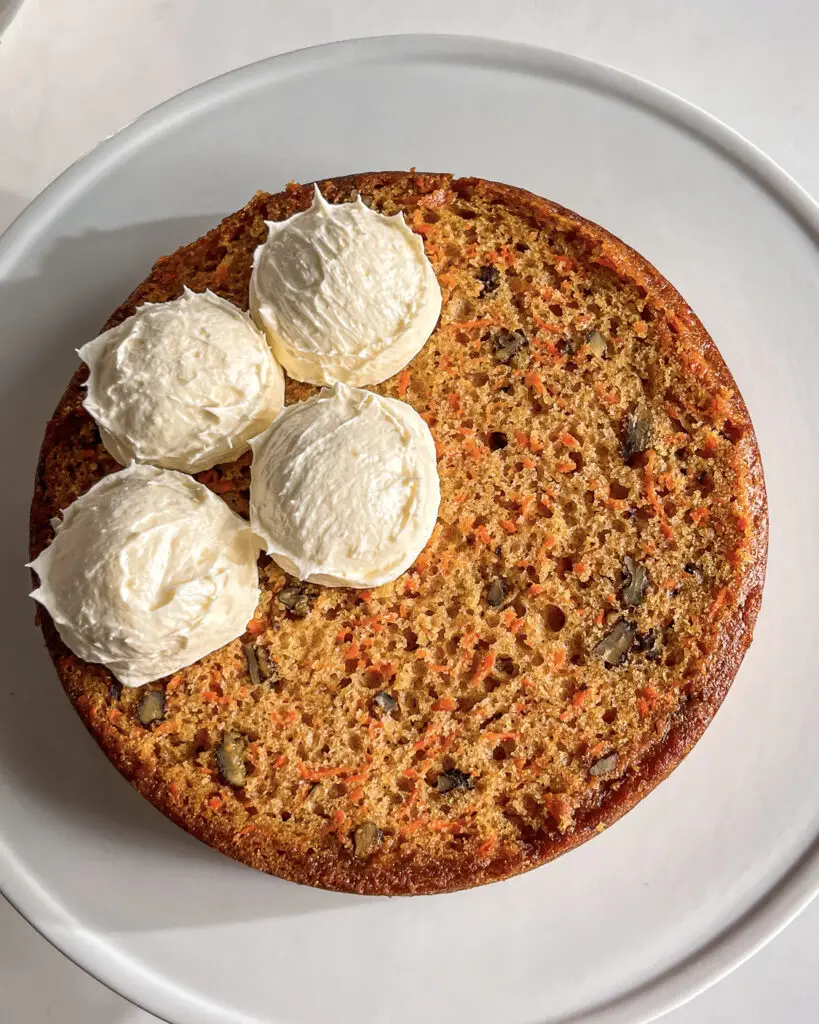Eggless Carrot Cake with cream cheese frosting and can be made vegan dairy-free.