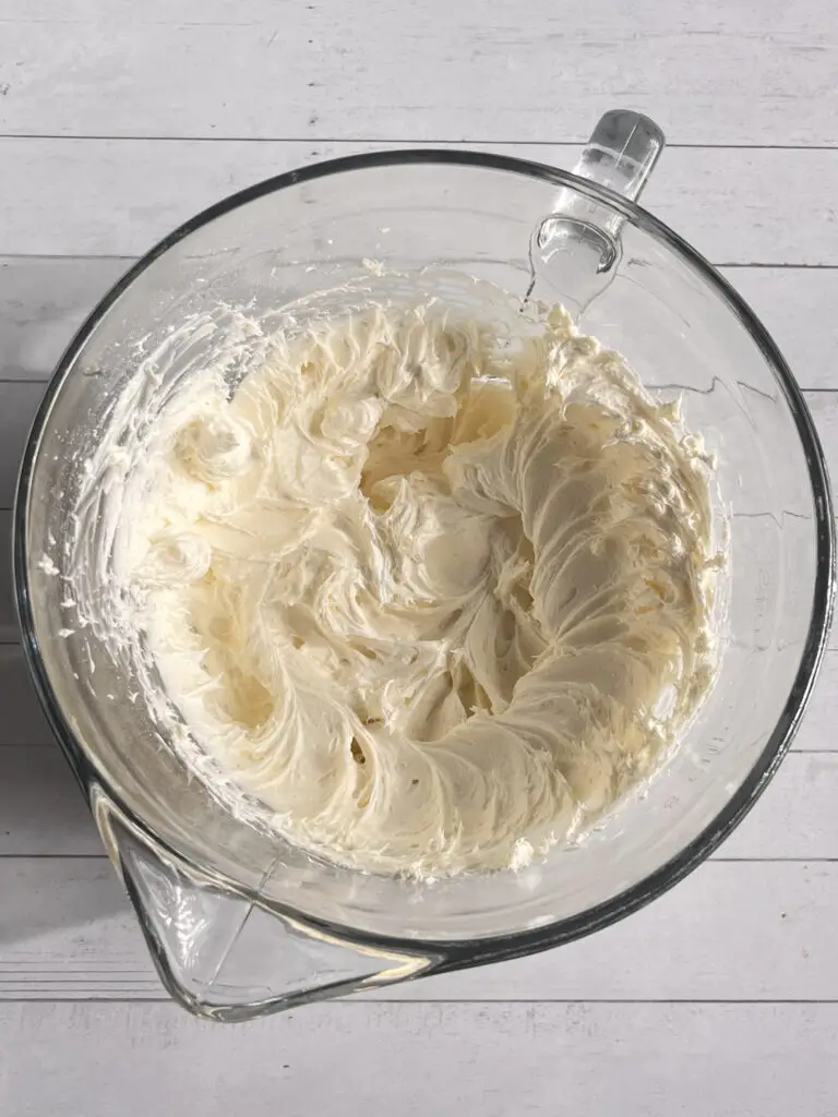 Eggless Carrot Cake with cream cheese frosting and can be made vegan dairy-free.