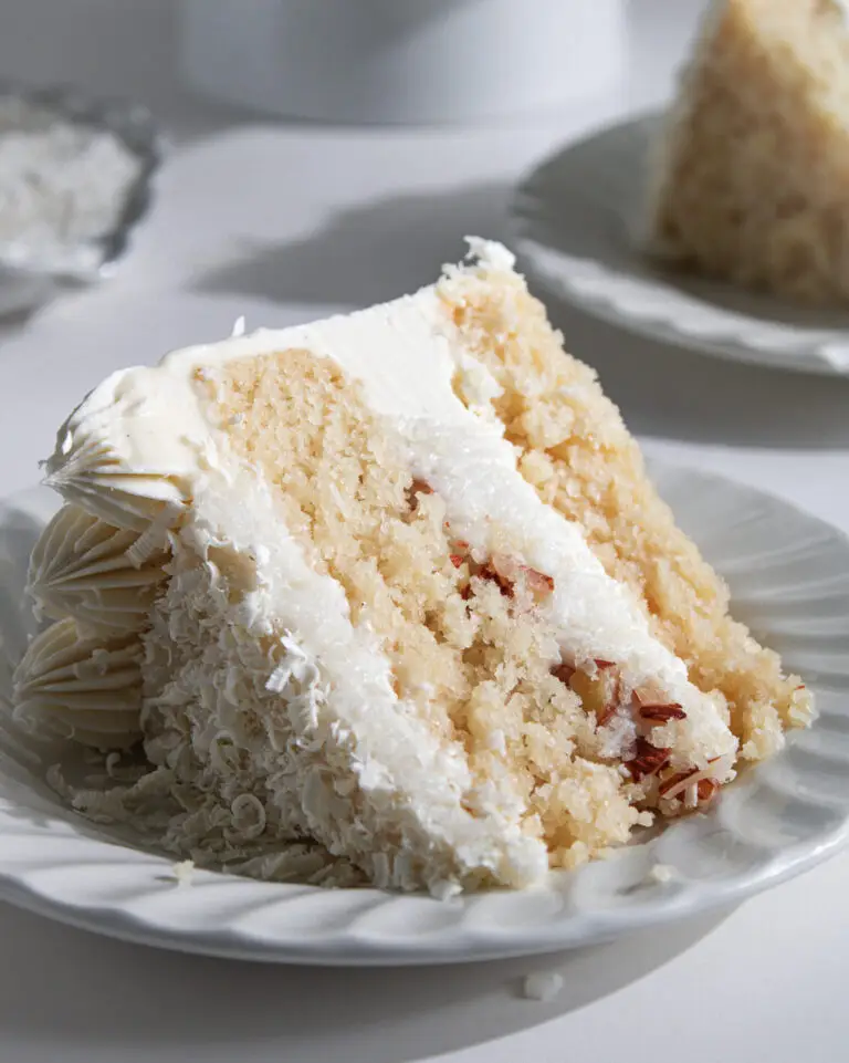 coconut white chocolate layer cake eggless on a plate