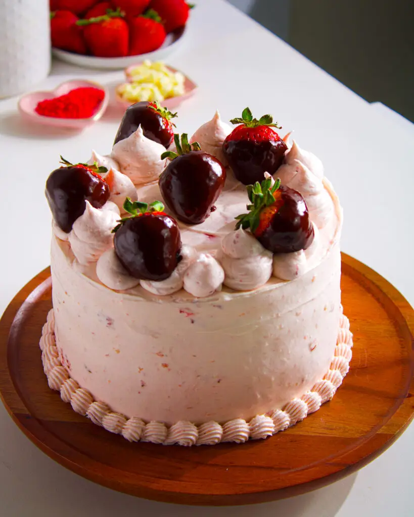Dairy free chocolate strawberry layer cake with fresh strawberries