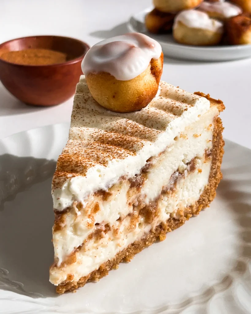 creamy Cinnamon Roll Cheesecake without eggs on a plate