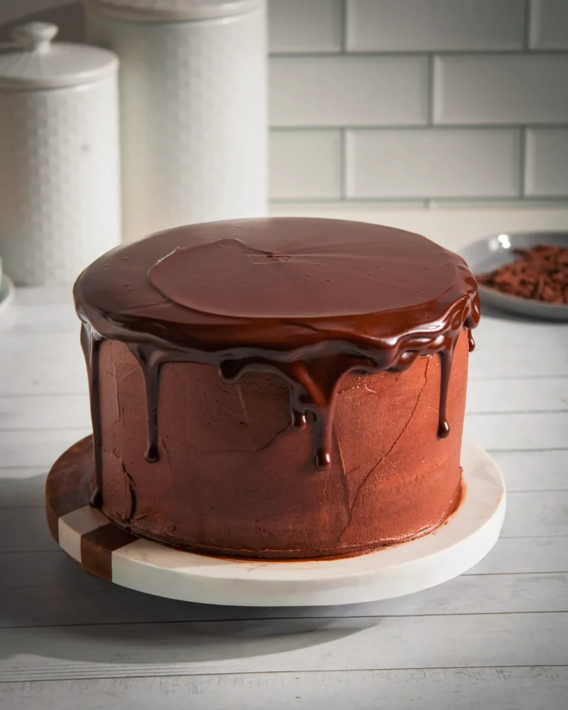 eggless layered vanilla cake with chocolate fudge
